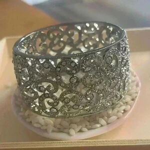 Chunky Silver tone sparkling rhinestone bangle bracelet fillagree detail